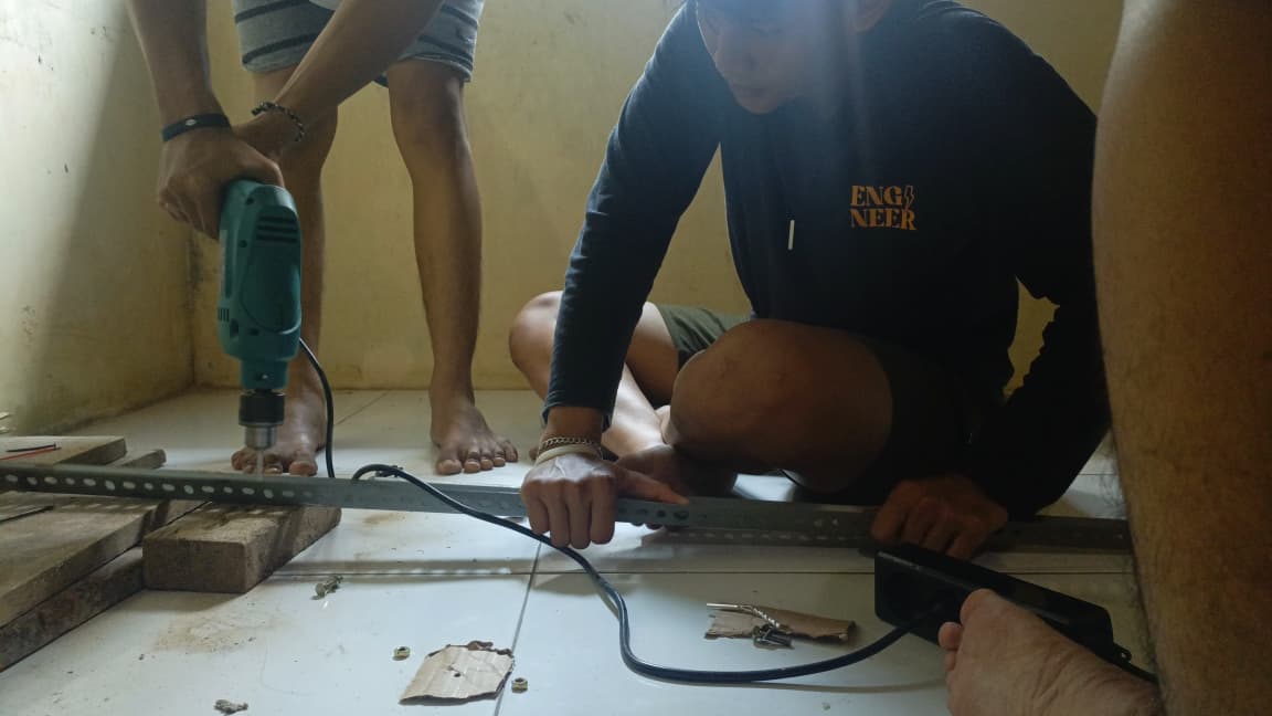 Pembuatan Plang Tikum