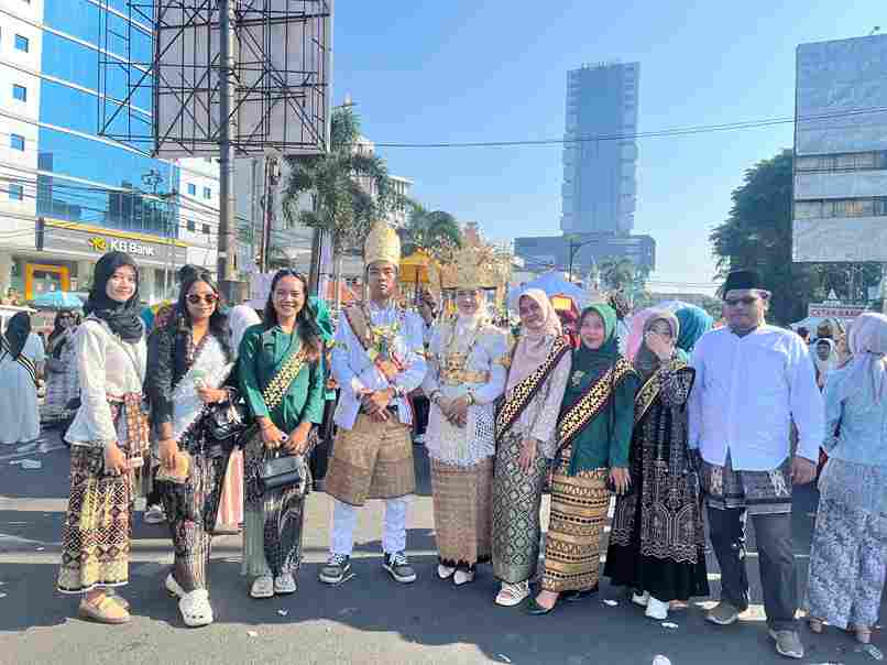 Mahasiswa KKN Kampung Baru berpartisipasi dalam Festival Tari Ngigel HUT ke-343 Kota Bandar Lampung.