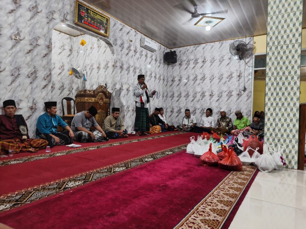 Current image: Mahasiswa KKN Desa Way Lunik 2 Universitas Lampung menghadiri peringatan Isra Mikraj di Masjid Jammi Raudatul Jannah.