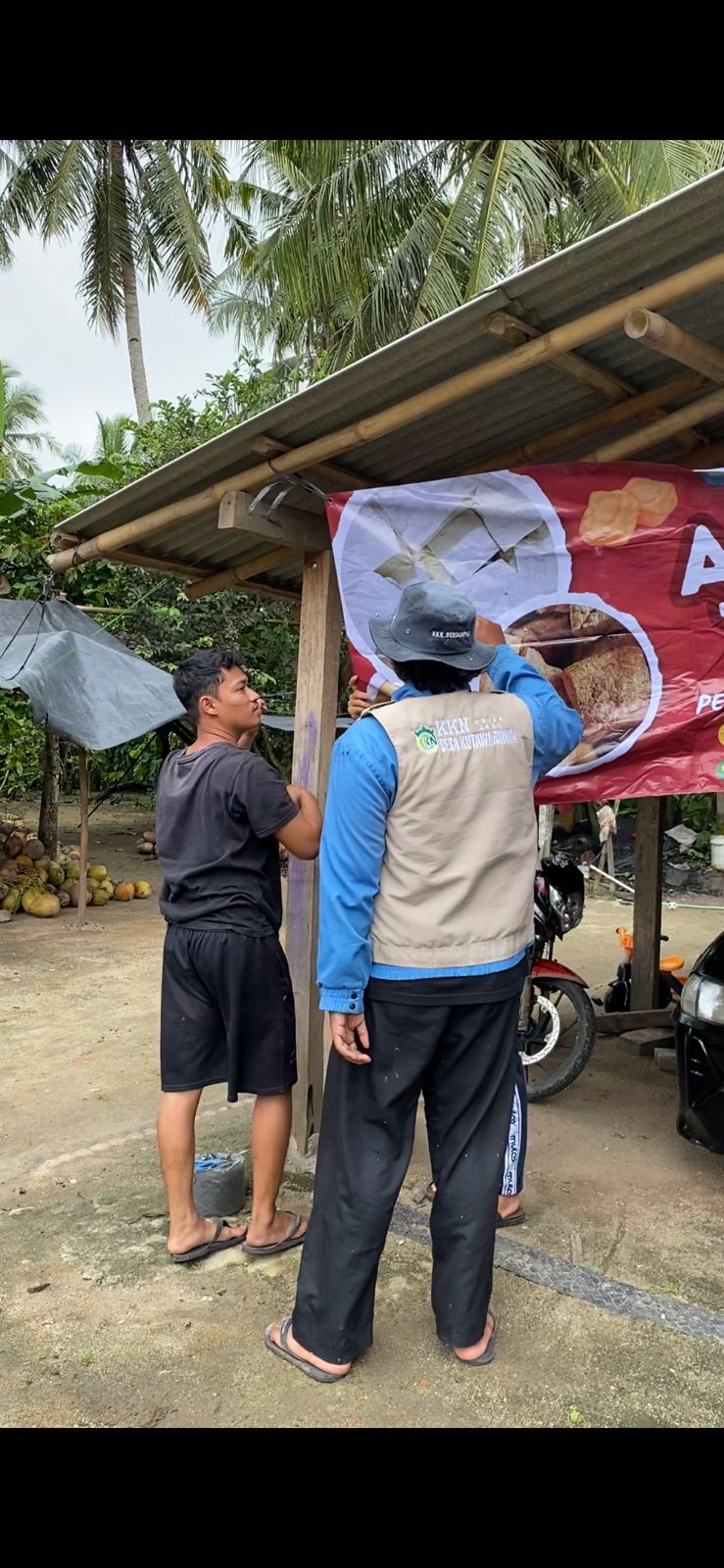 pasang banner agung tahu